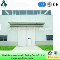 Sliding door used in the big warehouse |windproof sliding door with small door on it